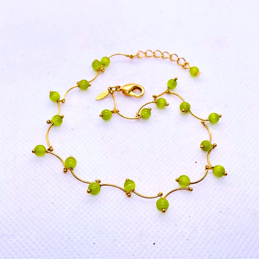 Pretty Green cat eye beaded gold tone stick “Avon” Anklet 11”